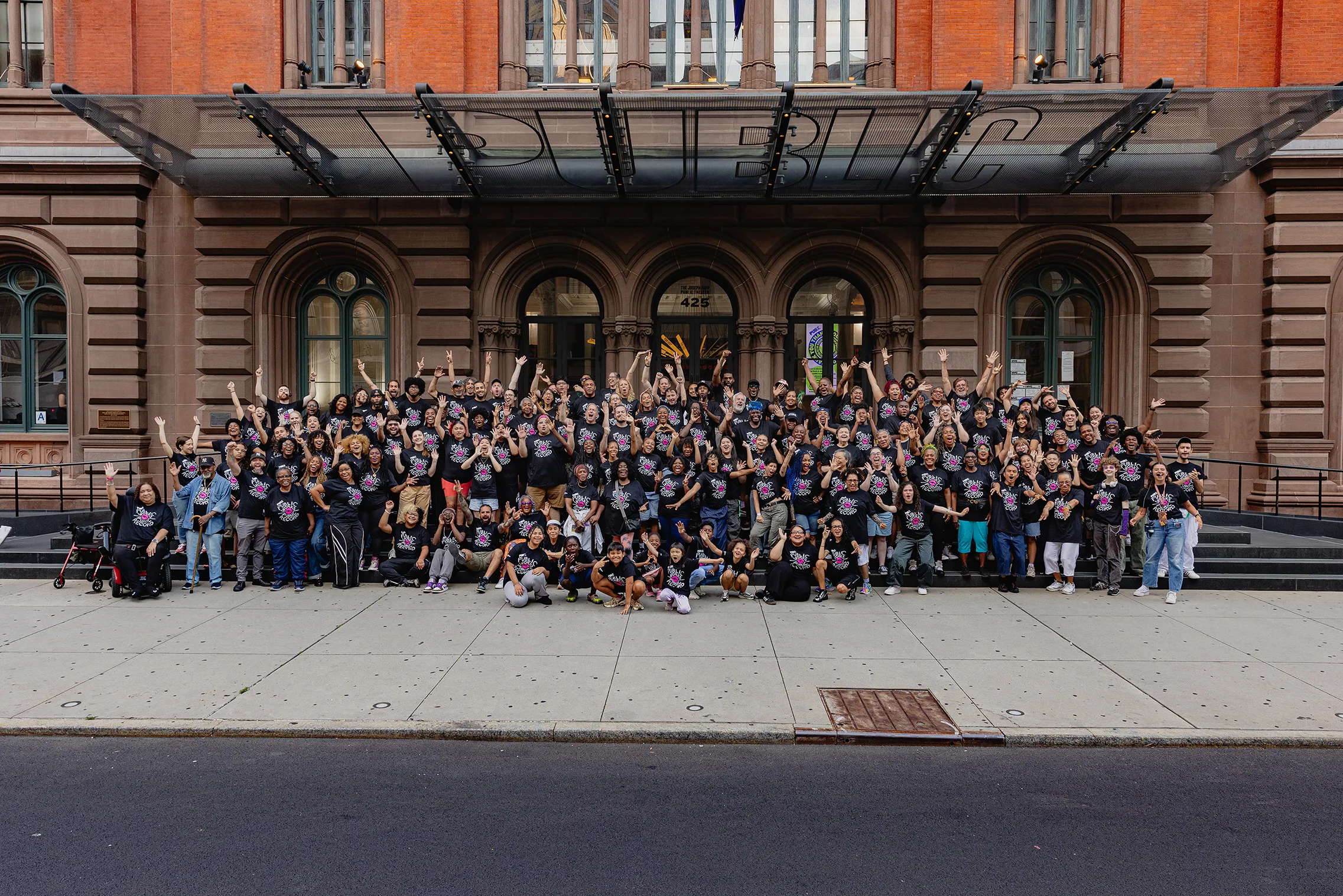 The community ensemble and creative team of Public Works’ PUBLIC RECORD. Photo by Marc J. Franklin. 