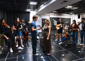 Andrew Durand and Kelsee Kimmel (center) and the company.